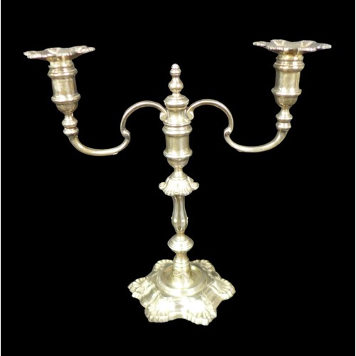 98 - An Elizabeth II silver twin branched candelabra, the knopped stem with foliate decoration, removable... 