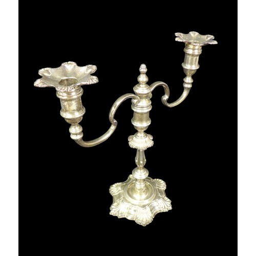 98 - An Elizabeth II silver twin branched candelabra, the knopped stem with foliate decoration, removable... 