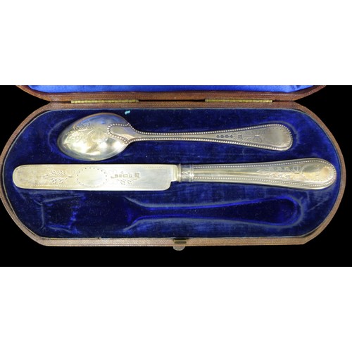 64 - A small group of silver items, comprising a Victorian silver nine piece tea spoon set, with spoons, ... 