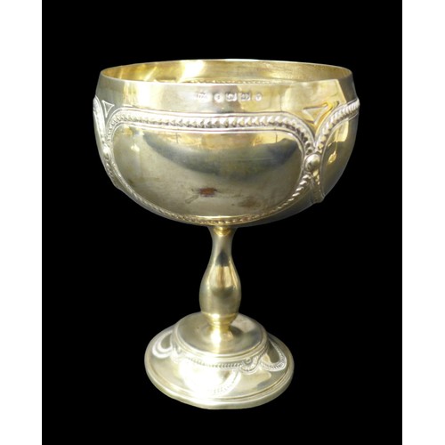 95 - A group of three Victorian and later silver goblets / trophies, comprising one with large bowl embos... 