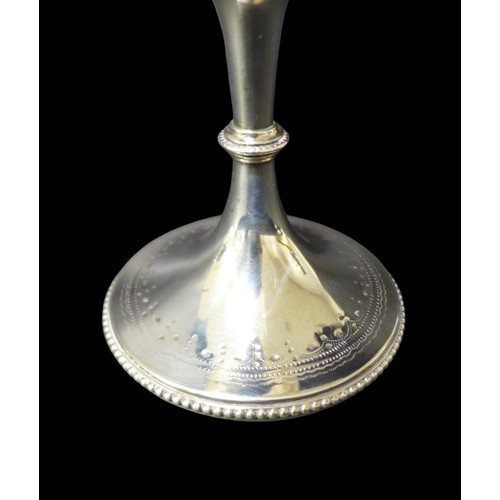95 - A group of three Victorian and later silver goblets / trophies, comprising one with large bowl embos... 