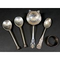 A small group of silver, comprising two seal top spoons, 13cm, a strainer spoon, 15cm, a teaspoon, 1... 