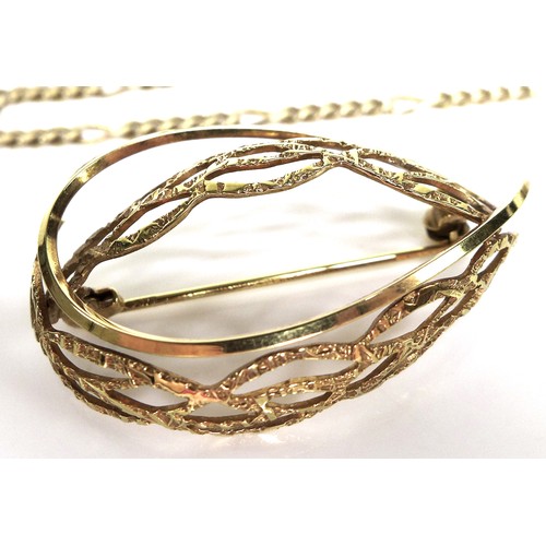 308 - A 9ct gold figaro link chain, 45cm, with lobster clasp, 6.2g, and a 9ct gold brooch of curving textu... 