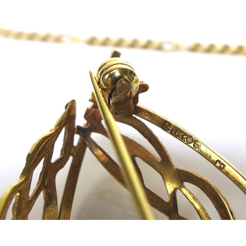 308 - A 9ct gold figaro link chain, 45cm, with lobster clasp, 6.2g, and a 9ct gold brooch of curving textu... 