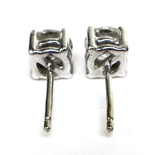 374 - A pair of 18ct white gold and diamond stud earrings, each brilliant cut stone 5.5mm diameter by 3.5m... 