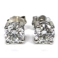 A pair of 18ct white gold and diamond stud earrings, each brilliant cut stone 5.5mm diameter by 3.5m... 