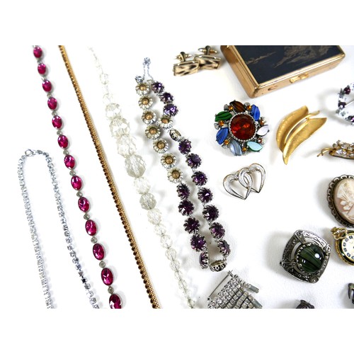 256 - A small group of costume jewellery, including a silver hinged bangle, 39.6g, boxed, a vintage Christ... 