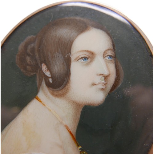 307 - A Victorian miniature portrait depicting a young Queen Victoria, after the original by Sir W C Ross ... 