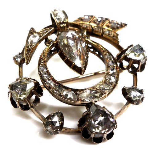 372 - A Victorian multi-stone diamond pendant brooch, set with twenty six diamonds, the central, largest s... 