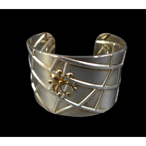 275 - A Tiffany & Co. silver web cuff bangle, designed by Elsa Peretti, with spider and web design, 1.8toz... 