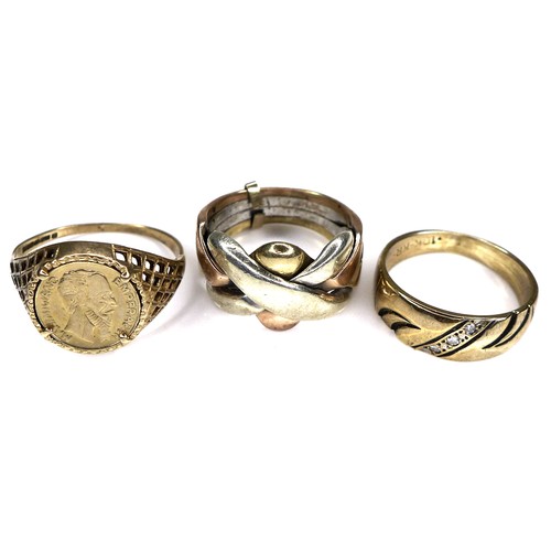 313 - A group of three 9ct gold rings, comprising one tri-colour, size J, one set with a 'Emperador Maximi... 