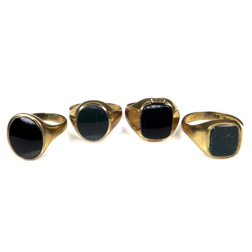 343 - A group of four 9ct gold signet rings, two set with bloodstone and two set with black onyx, 14 to 17... 