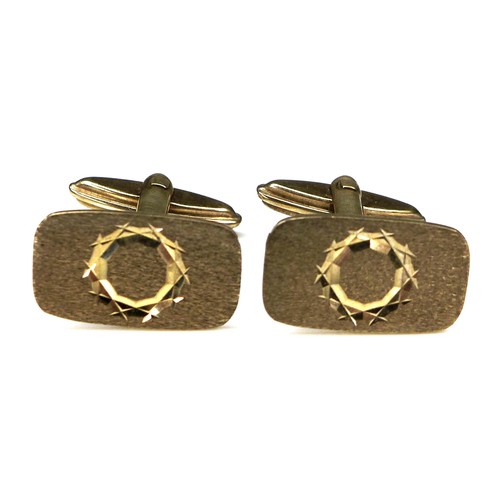 283 - A pair of vintage 9ct gold cufflinks, of rounded rectangular form with engraved circle decoration, p... 