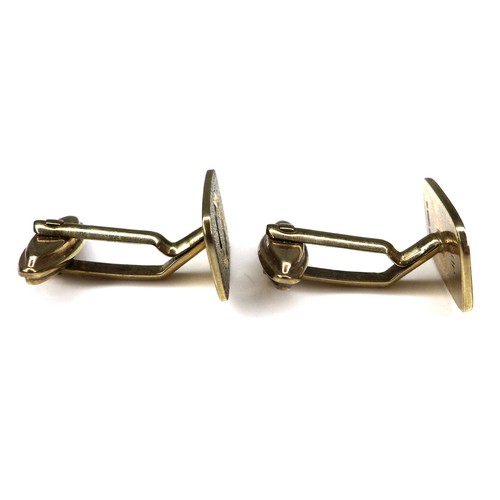 283 - A pair of vintage 9ct gold cufflinks, of rounded rectangular form with engraved circle decoration, p... 