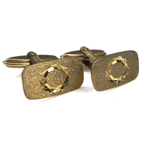 283 - A pair of vintage 9ct gold cufflinks, of rounded rectangular form with engraved circle decoration, p... 