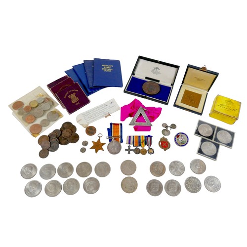 138 - A collection of coins and medallions, including a silver Masonic medal of office, of triangular form... 