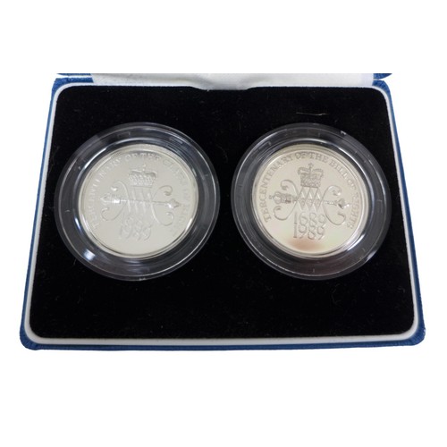 127 - Three Royal Mint silver proof coin sets, comprising a 1987 silver proof piedfort £1 coin, together w... 
