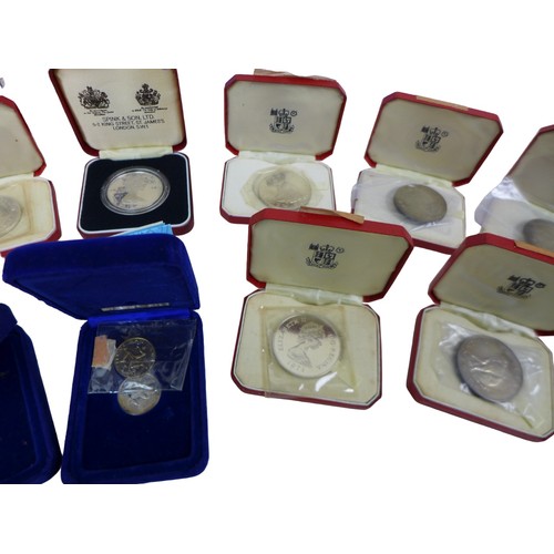 129 - A collection of Isle of Man and Gibraltar coins, including an Isle of Man 1975 Sterling silver decim... 
