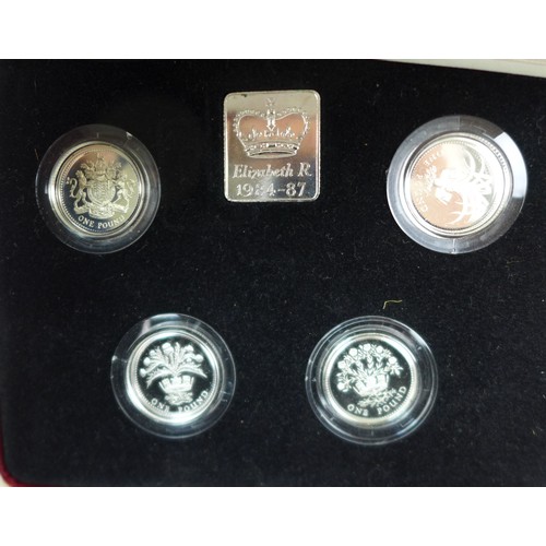 115 - A Royal Mint Silver Proof £1 collection 1984-1987, with presentation case and certificate, a 1990 si... 