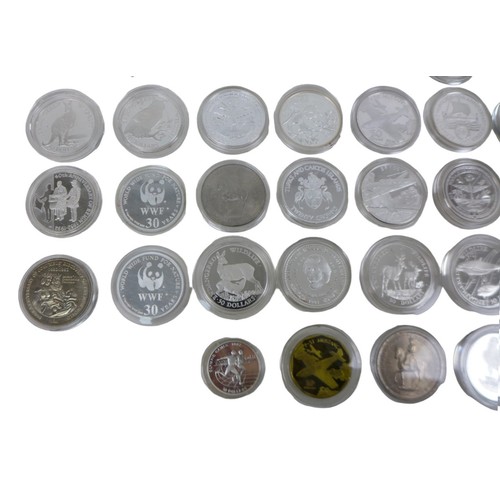 113 - A collection of assorted British commemorative coins, including forty-one Republic of Marshall Islan... 