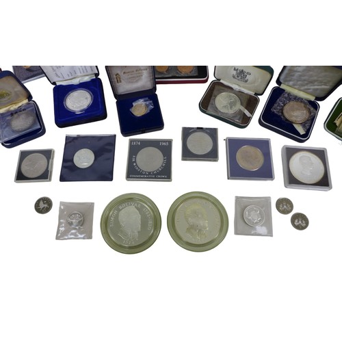 114 - A collection of assorted British and Commonwealth commemorative coins, including a '1973 First Offic... 
