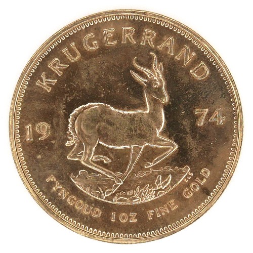 A 22ct gold South African Krugerrand, 1974, 'Fyngoud 1oz Fine Gold', 32.4mm, 34.0g.