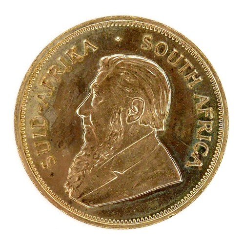 199 - A 22ct gold South African Krugerrand, 1975, 'Fyngoud 1oz Fine Gold', 32.4mm, 34.0g.