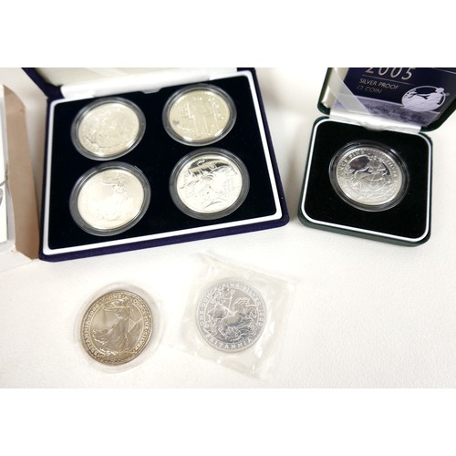 144 - A collection of ERII silver Britannia coins, comprising a Royal Mint silver proof Britannia One Ounc... 