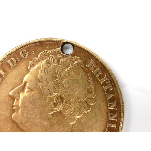 196 - A George IIII gold double sovereign, two pounds coin, 1823, 27.8mm, 15.8g, a/f drilled hole to edge.