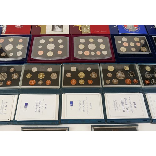 183 - A collection of twenty three UK Royal Mint issue proof sets, 1985, 1987, 1990, 1992, 1993, 1994, 199... 