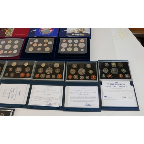 183 - A collection of twenty three UK Royal Mint issue proof sets, 1985, 1987, 1990, 1992, 1993, 1994, 199... 