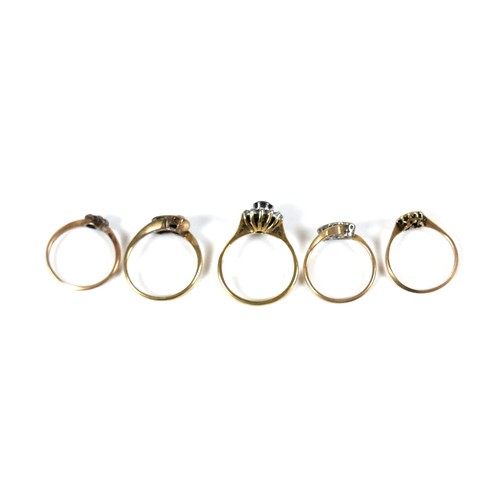 299 - A group of five 18ct gold rings, in a variety of designs, sizes M, M, L, J, and K, total gross weigh... 