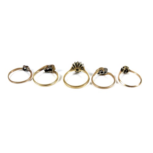 299 - A group of five 18ct gold rings, in a variety of designs, sizes M, M, L, J, and K, total gross weigh... 