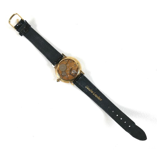 216 - An Ingersoll skeleton gold plated gentleman's wristwatch, case 33mm, on a black strap.
Notes: in wor... 