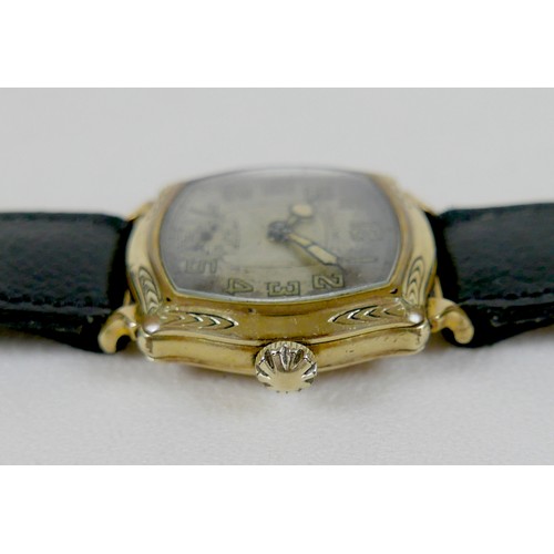 240 - A rare Illinois gold plated gentleman's wristwatch, with fancy cushion case, silvered dial with larg... 