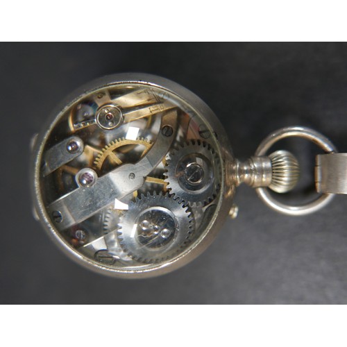 58A - An Edwardian white metal fob watch of spherical form, with Roman numeral dial, and visible movement ... 