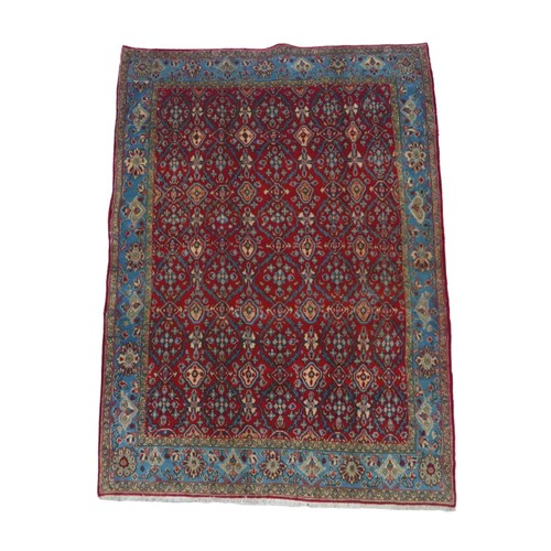 272 - A Hamadan rug, red ground with repeating pattern to central panel, two narrow cream, floral borders ... 