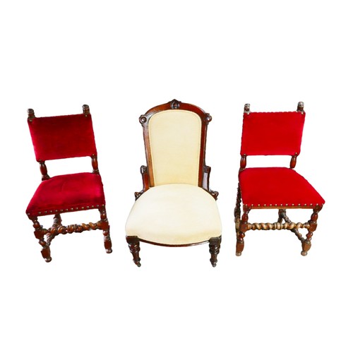 253 - A Victorian nursing chair, with mahogany frame and cream upholstered back and seat, raised upon cast... 