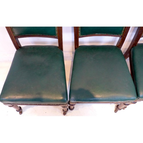 249 - A set of four late Victorian dining chairs, carved frames, green leatherette seats and backs, each 4... 