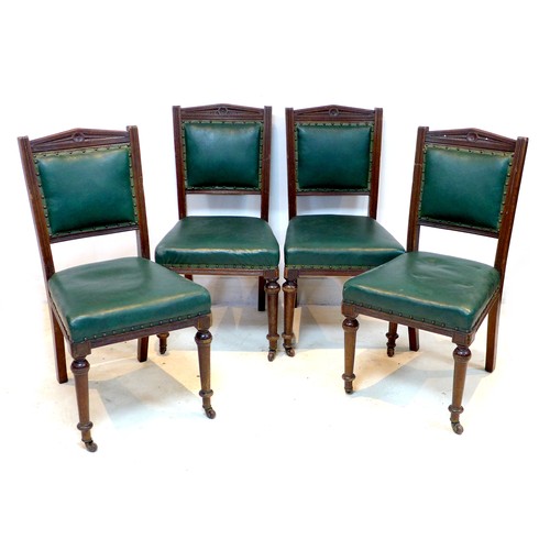 249 - A set of four late Victorian dining chairs, carved frames, green leatherette seats and backs, each 4... 