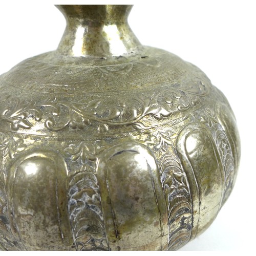 2 - A white metal or brass silvered bottle vase, likely 19th century Indian the gourd form base decorate... 