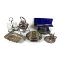 A small group of silver plated items, comprising kettle and burner stand, swing handled basket, ture... 
