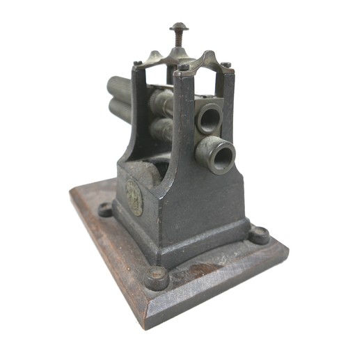 59 - An 19th century iron crimping machine by G. W. Ingram of Birmingham, 23 by 15 by 20.5cm high.