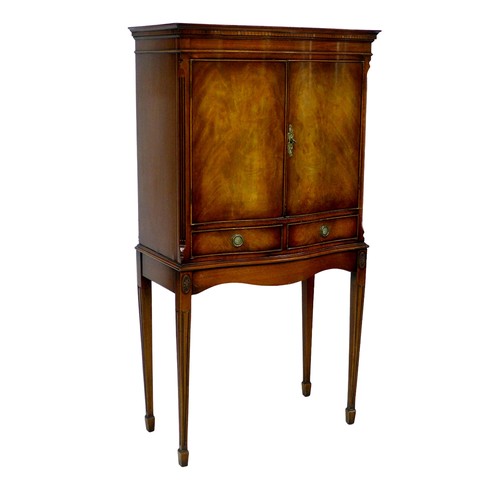 274 - A late 20th century cocktail cabinet, in George III style, with serpentine front, walnut veneers, tw... 