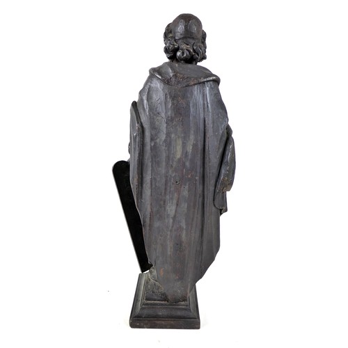 149 - An 18th century carved wooden sculpture of Moses and the Ten Commandments, raised on square plinth, ... 