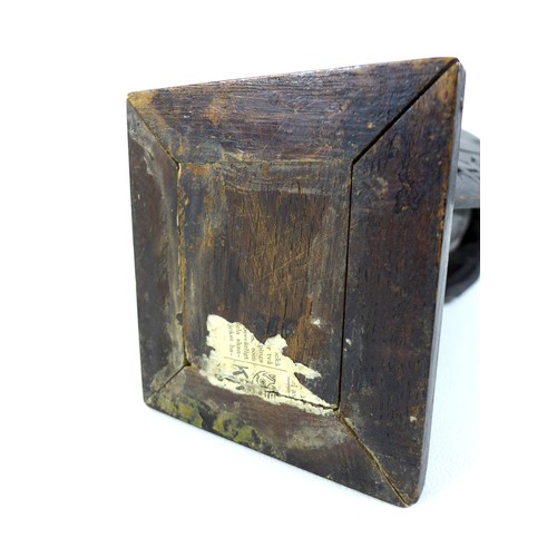 149 - An 18th century carved wooden sculpture of Moses and the Ten Commandments, raised on square plinth, ... 