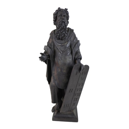 149 - An 18th century carved wooden sculpture of Moses and the Ten Commandments, raised on square plinth, ... 