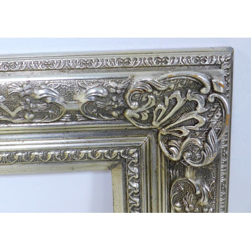 166 - A modern silver coloured frame, 125 by 7 by 103cm.