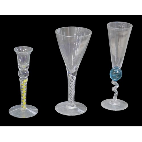 20 - Three 20th century continental decorative wine glasses, all indistinctly signed, comprising an air t... 