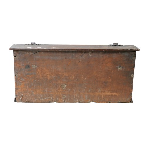 148 - An 18th century oak Bible box, with carved front panel and interior cubby holes, 57.5 by 37.5 by 27c... 